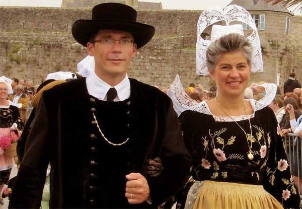 a couple wearing traditional french dress