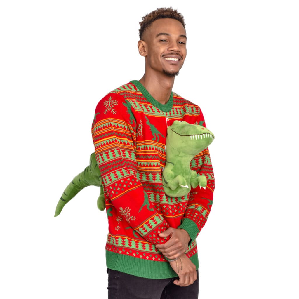 a guy wearing ugly red christmas sweater