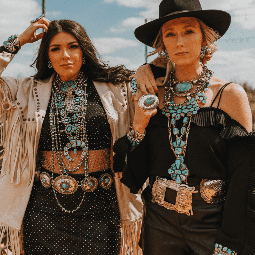 two girls styling turqoise jewelry in blue color