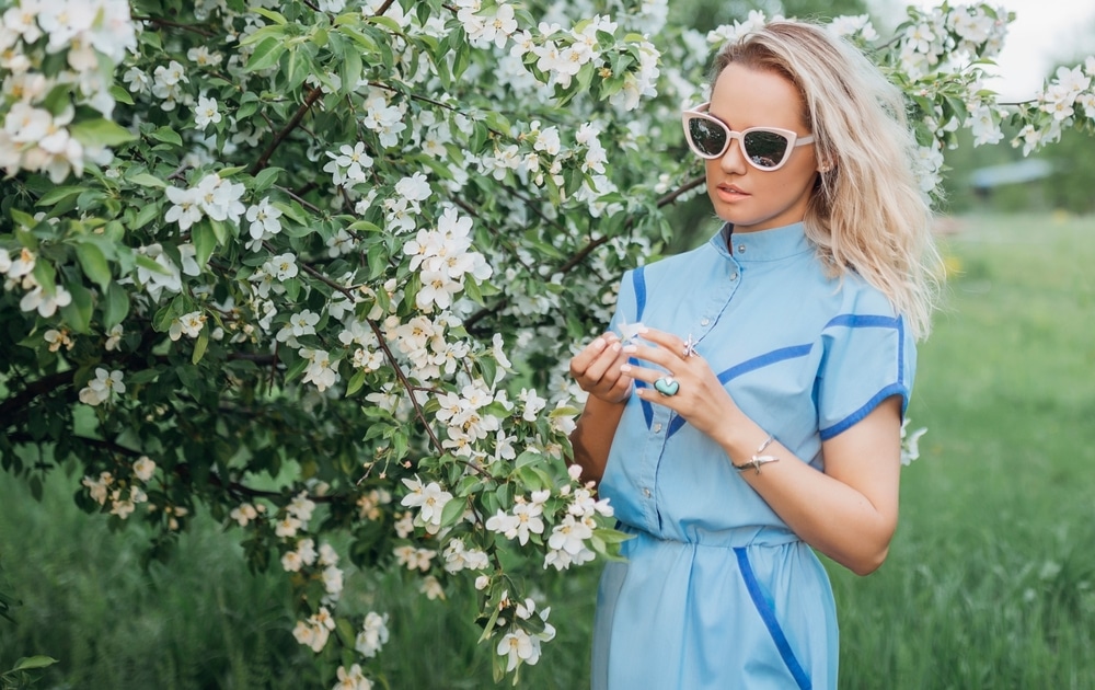 Outdoors Lifestyle Fashion Portrait Of Beautiful Blonde Woman Walking In